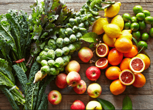 a group of fruits and vegetables on a wood surface Healthy Weight Loss Diets Cheshire